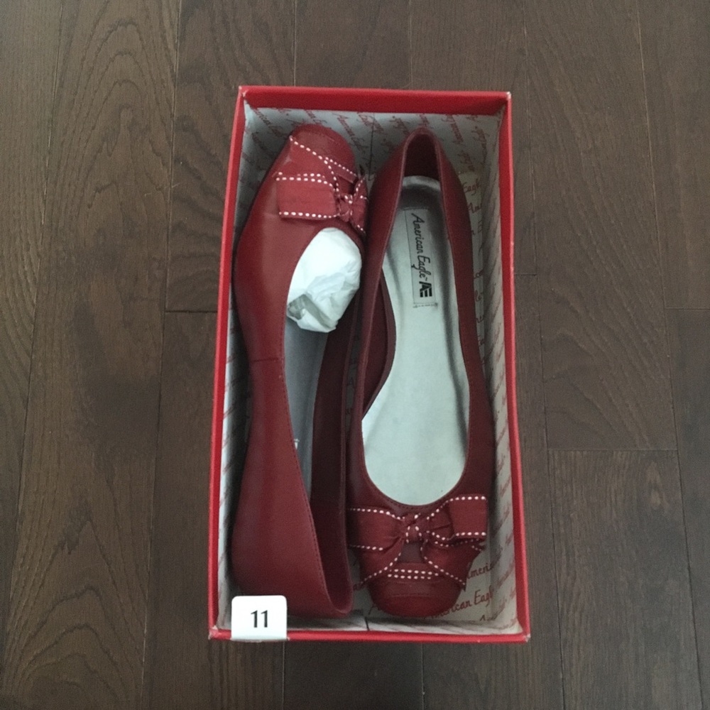 BRAND NEW red bow flats from American Eagle